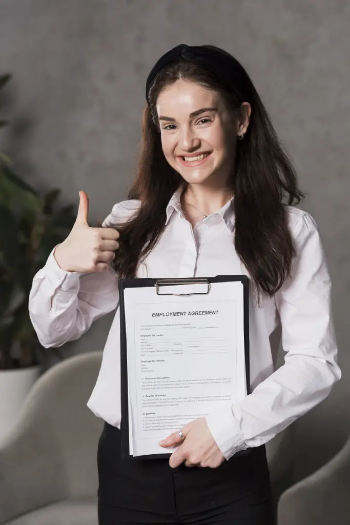 front-view-woman-holding-contract-giving-thumbs-up